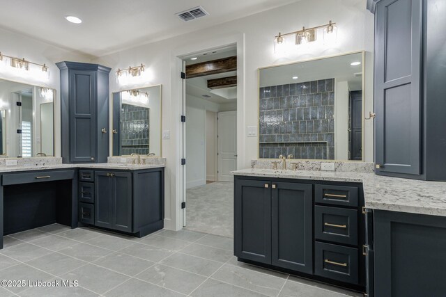 7726 46th St, Lubbock, TX 79407 - full bath with two vanities, tile patterned flooring, and recessed lighting