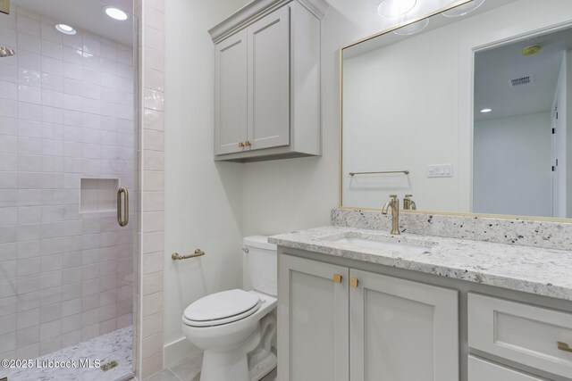 7726 46th St, Lubbock, TX 79407 - full bath with a stall shower, vanity, and recessed lighting