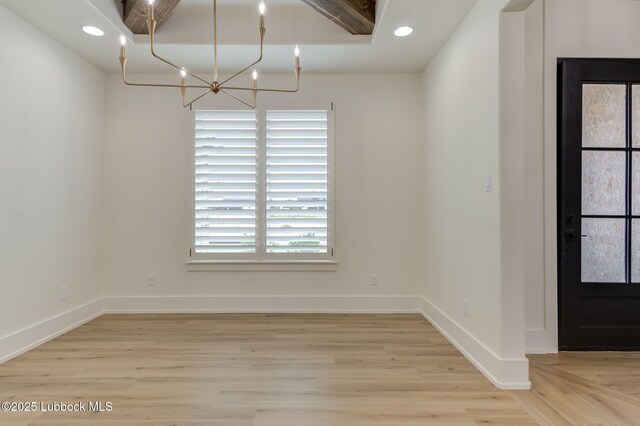 7726 46th St, Lubbock, TX 79407 - empty room with light wood-type flooring, a chandelier, and recessed lighting