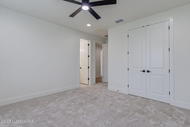 7726 46th St, Lubbock, TX 79407 - unfurnished bedroom featuring carpet floors, a closet, recessed lighting, and a ceiling fan