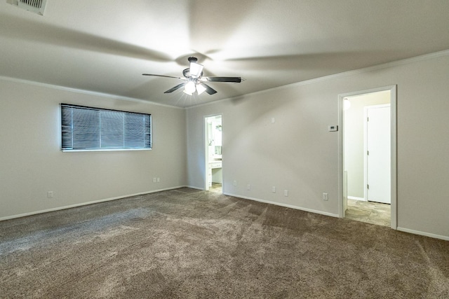 spare room with crown molding, ceiling fan, and carpet