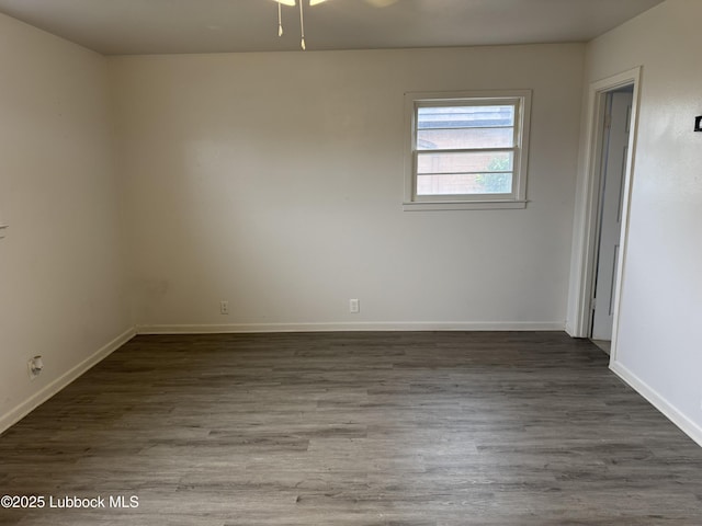 2721 52nd St, Lubbock, TX 79413 - spare room featuring baseboards and wood finished floors