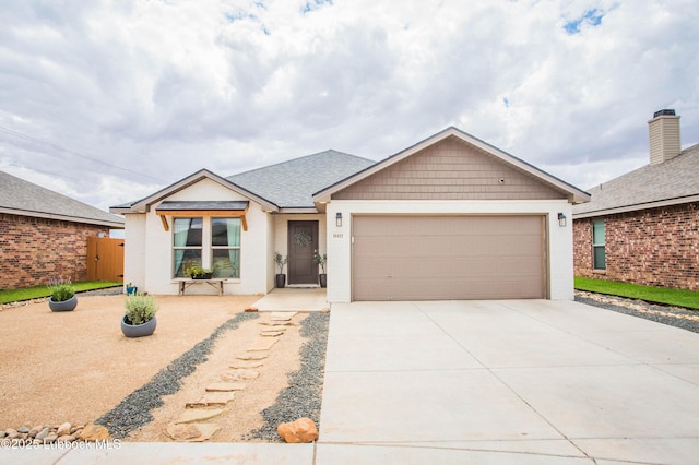 10422 Waverly Ave, Lubbock, TX 79424 - view of front of home with a garage and concrete driveway