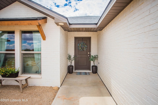 10422 Waverly Ave, Lubbock, TX 79424 - entrance to property with brick siding and roof with shingles