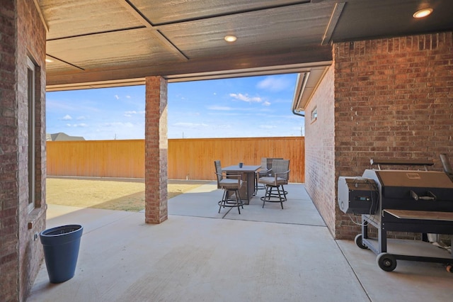 view of patio with a grill