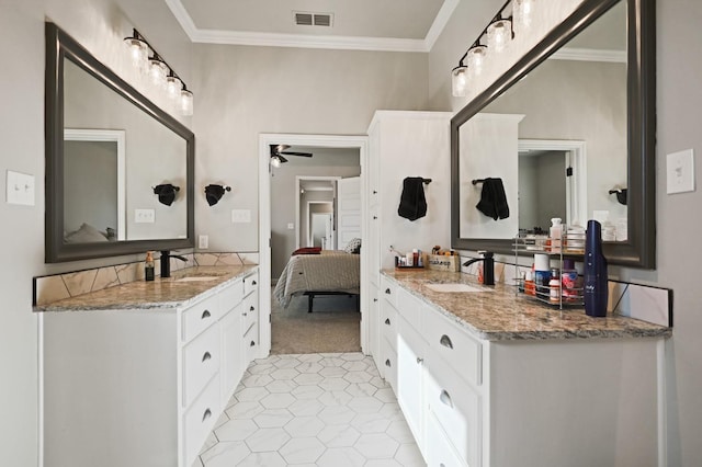 bathroom with crown molding, tile patterned floors, vanity, and ceiling fan