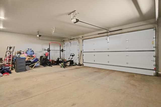 garage featuring a garage door opener