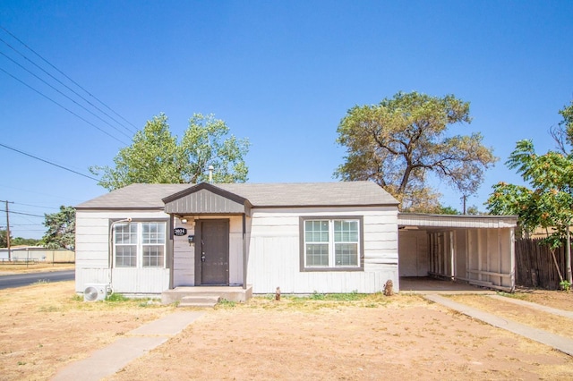 view of front of house with a carport