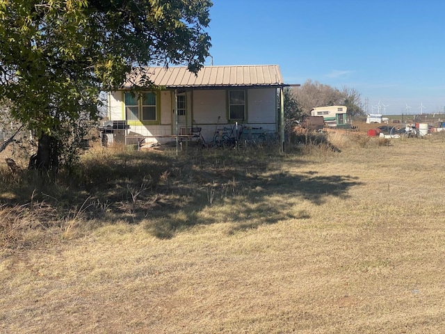 exterior space with a front yard