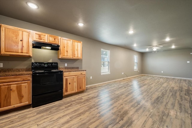 kitchen with black range with electric cooktop, light hardwood / wood-style flooring, ceiling fan, and light brown cabinets