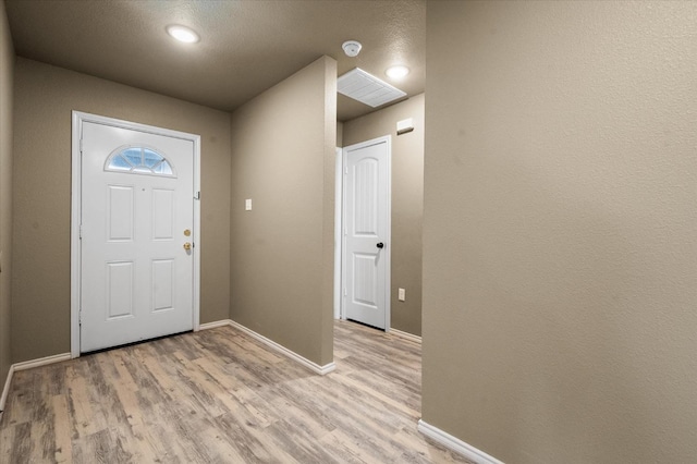 entryway with light wood-type flooring