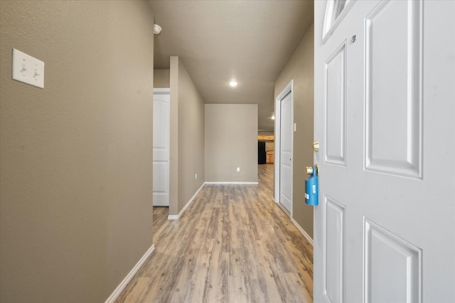 hall featuring light hardwood / wood-style flooring