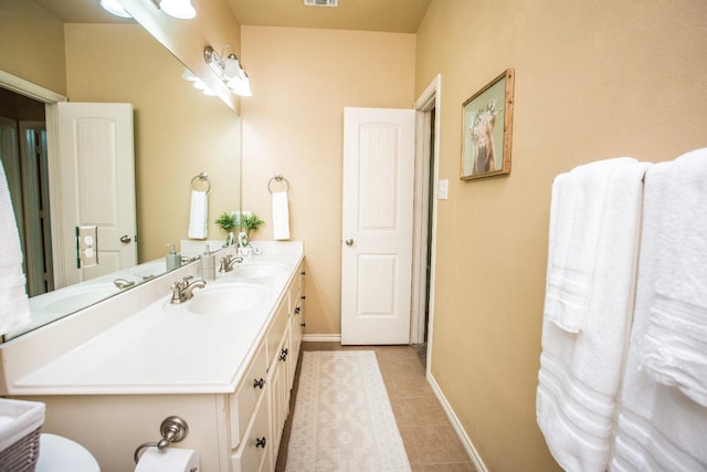 bathroom featuring vanity and tile patterned floors