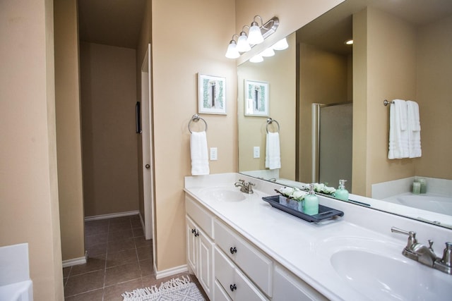 bathroom featuring tile patterned flooring, vanity, and separate shower and tub