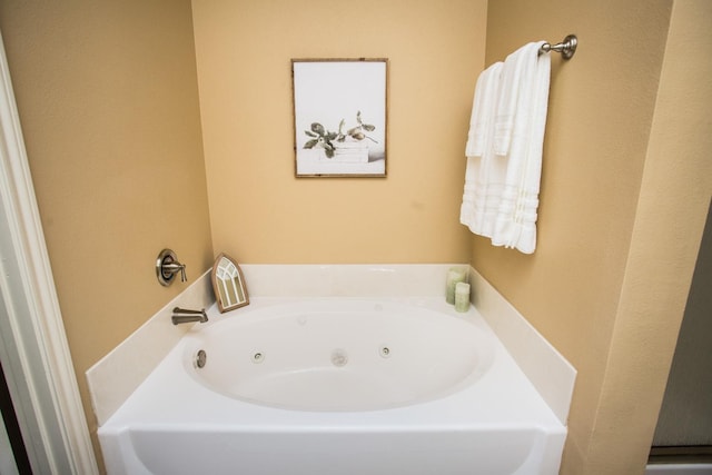 bathroom with a tub