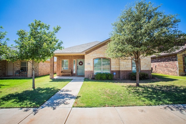 single story home featuring a front yard