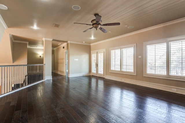 spare room featuring visible vents, baseboards, ceiling fan, crown molding, and hardwood / wood-style floors