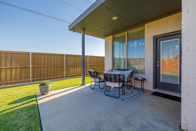 view of patio with fence