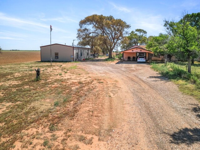 view of street featuring a rural view