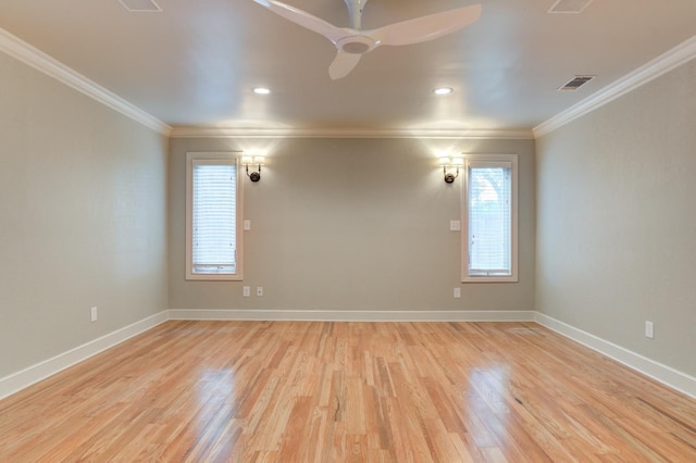 empty room with crown molding, ceiling fan, and light hardwood / wood-style floors