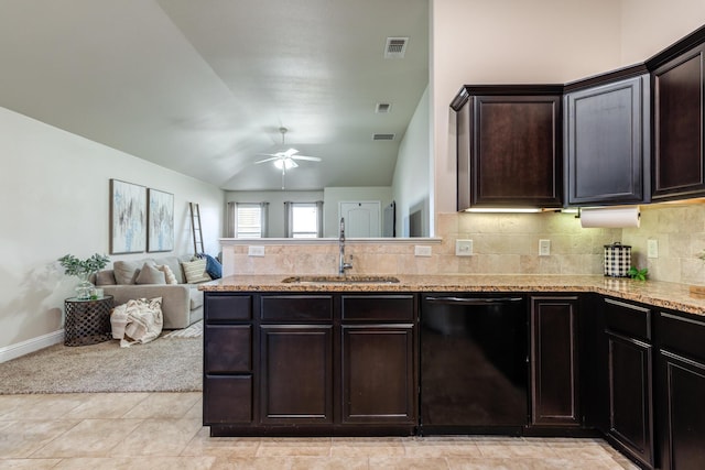kitchen featuring black dishwasher, ceiling fan, a sink, visible vents, and lofted ceiling