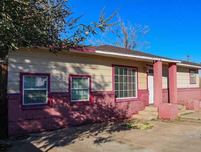 single story home featuring a patio area