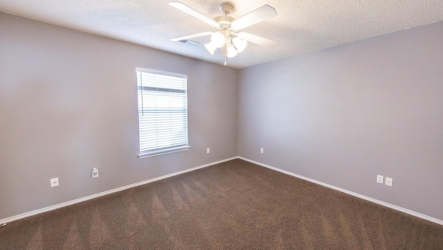 carpeted empty room with a textured ceiling and ceiling fan