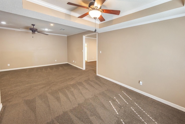 carpeted spare room with crown molding, a textured ceiling, and ceiling fan