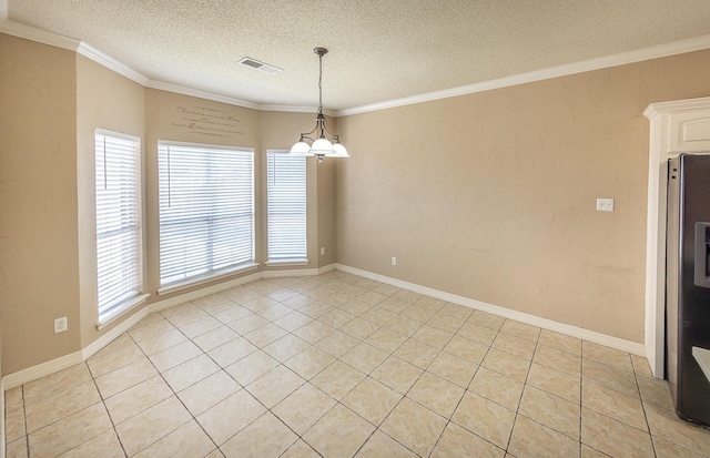 tiled empty room with crown molding, a healthy amount of sunlight, a textured ceiling, and a chandelier