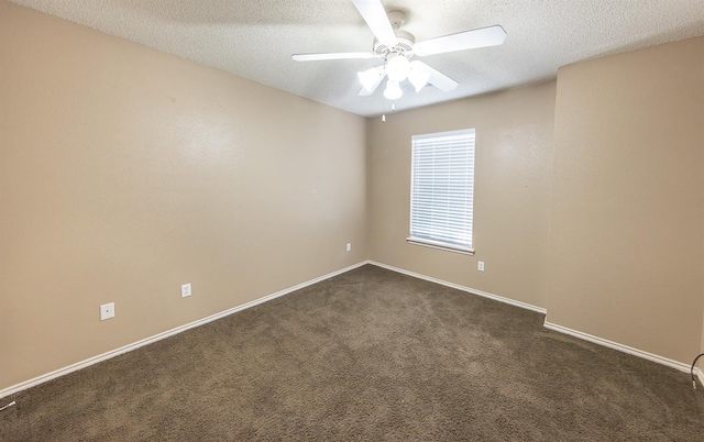 unfurnished room featuring dark colored carpet, a textured ceiling, and ceiling fan