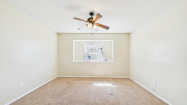 5768 38th St, Lubbock, TX 79407 - carpeted spare room with a ceiling fan, a textured ceiling, and baseboards
