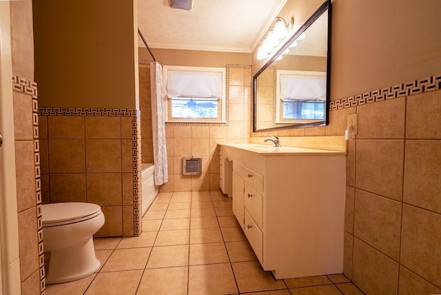 full bathroom with tile walls, tile patterned flooring, and shower / tub combo with curtain