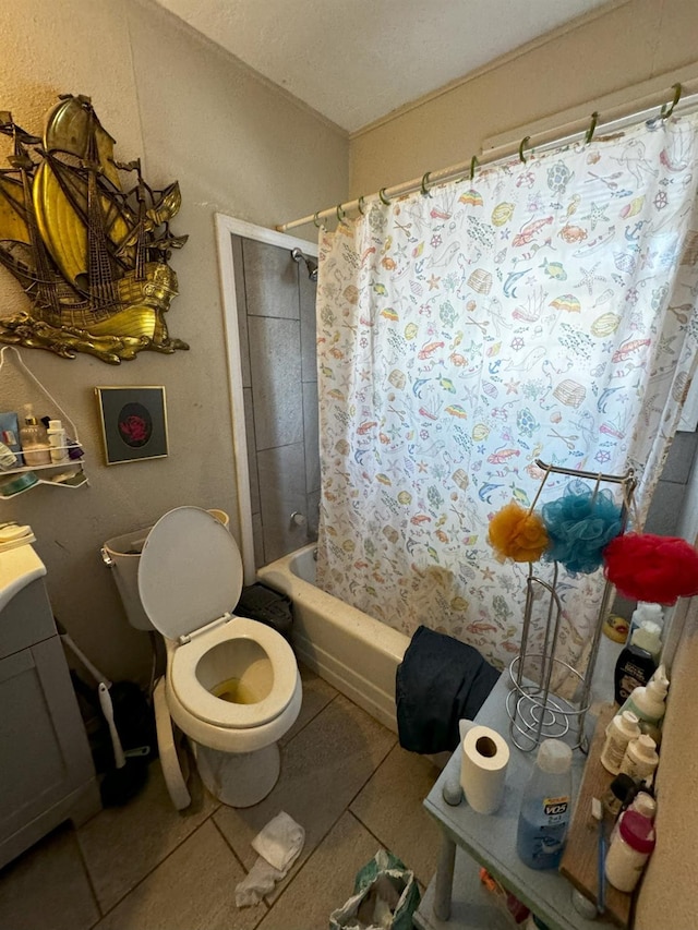 full bathroom with tile patterned flooring, vanity, shower / tub combo with curtain, and toilet