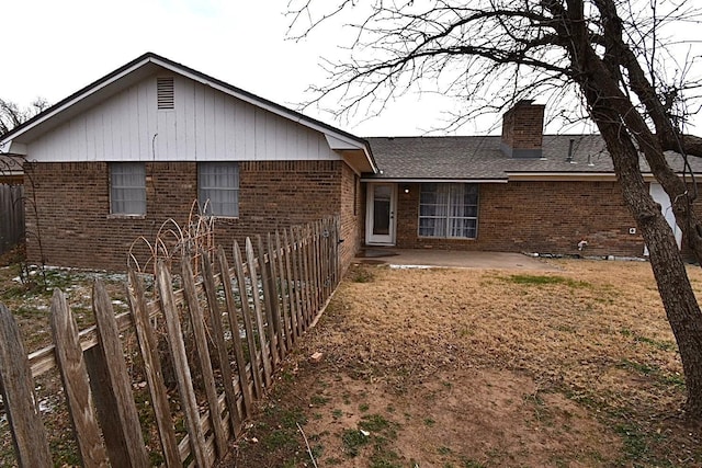 back of house featuring a patio