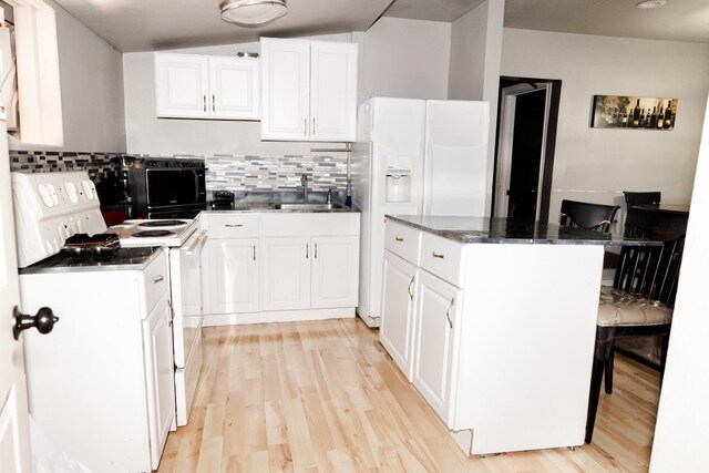 kitchen featuring sink, white cabinets, white appliances, and light hardwood / wood-style floors