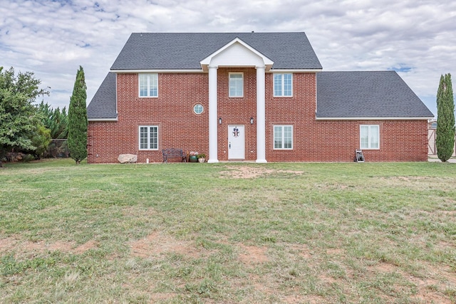 view of front facade with a front lawn