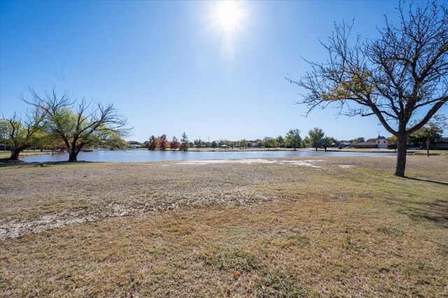 view of yard with a water view