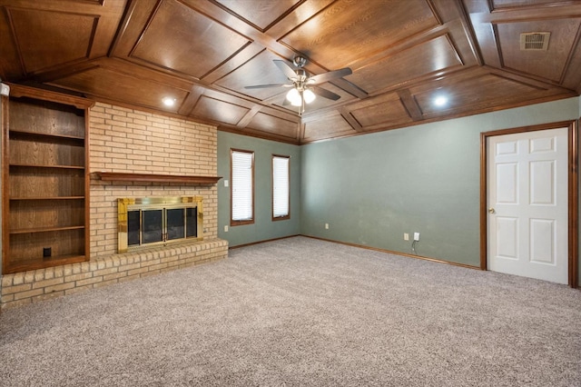 unfurnished living room featuring coffered ceiling, wood ceiling, carpet floors, ceiling fan, and a fireplace