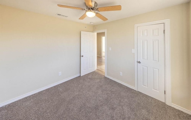 unfurnished bedroom with carpet and ceiling fan