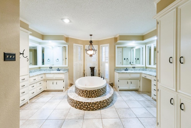 bathroom featuring vanity, tile patterned flooring, and ornamental molding