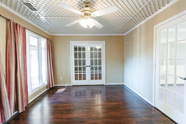 unfurnished room featuring french doors, ceiling fan, dark hardwood / wood-style flooring, and crown molding