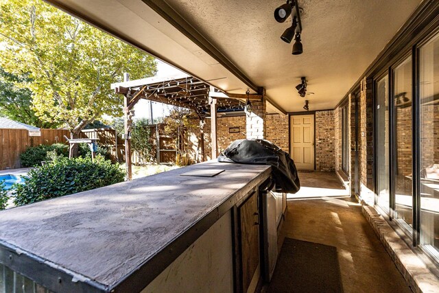 view of patio / terrace with a grill