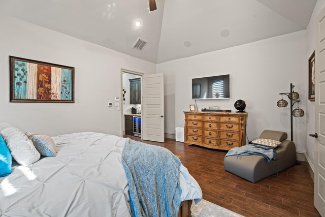 bedroom with ceiling fan, dark hardwood / wood-style floors, and high vaulted ceiling