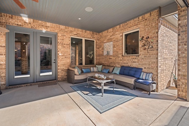 view of patio / terrace featuring french doors, ceiling fan, and an outdoor hangout area