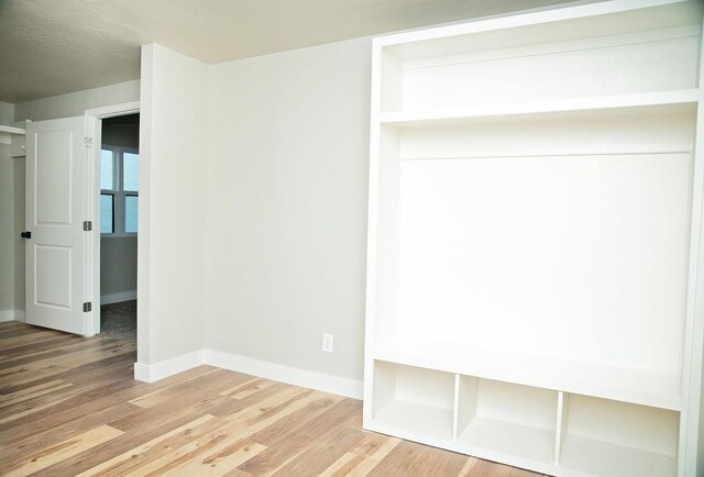 interior space with hardwood / wood-style floors