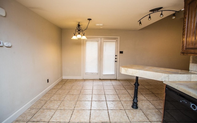 entryway featuring light tile patterned floors