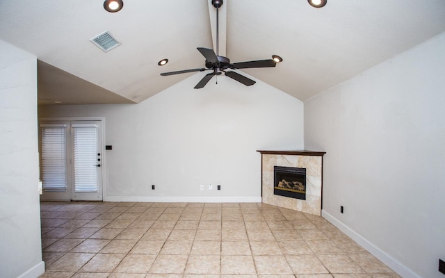 unfurnished living room featuring ceiling fan, lofted ceiling, and a premium fireplace