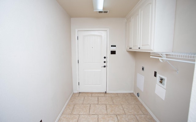 clothes washing area featuring washer hookup, cabinets, and hookup for an electric dryer