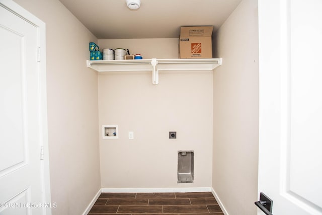7314 29th St, Lubbock, TX 79407 - washroom featuring washer hookup, wood finish floors, and hookup for an electric dryer
