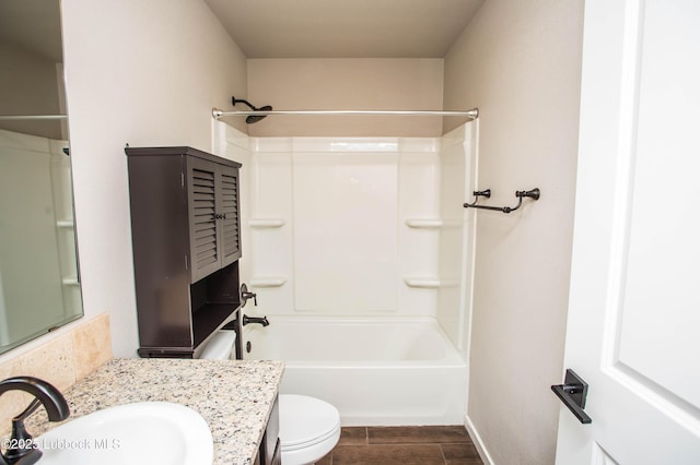 7314 29th St, Lubbock, TX 79407 - full bathroom featuring vanity,  shower combination, and wood finished floors